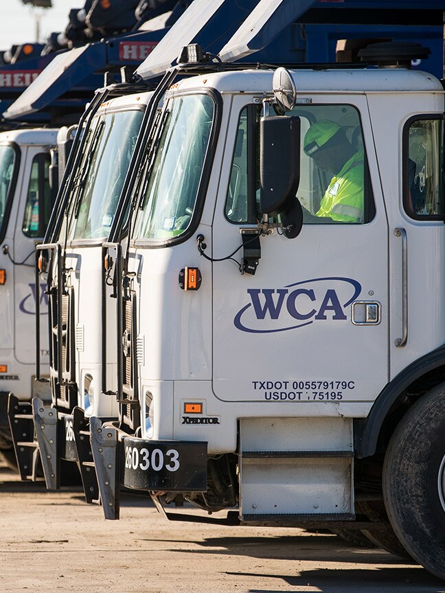 WCA trucks parked in a row