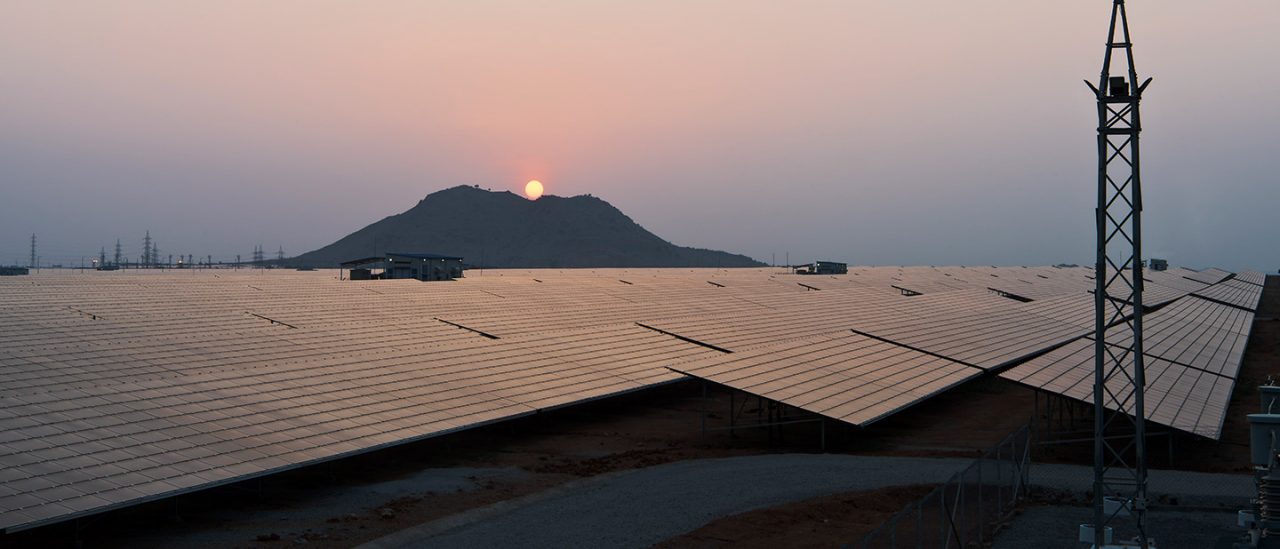 Sunset over solar panel farm